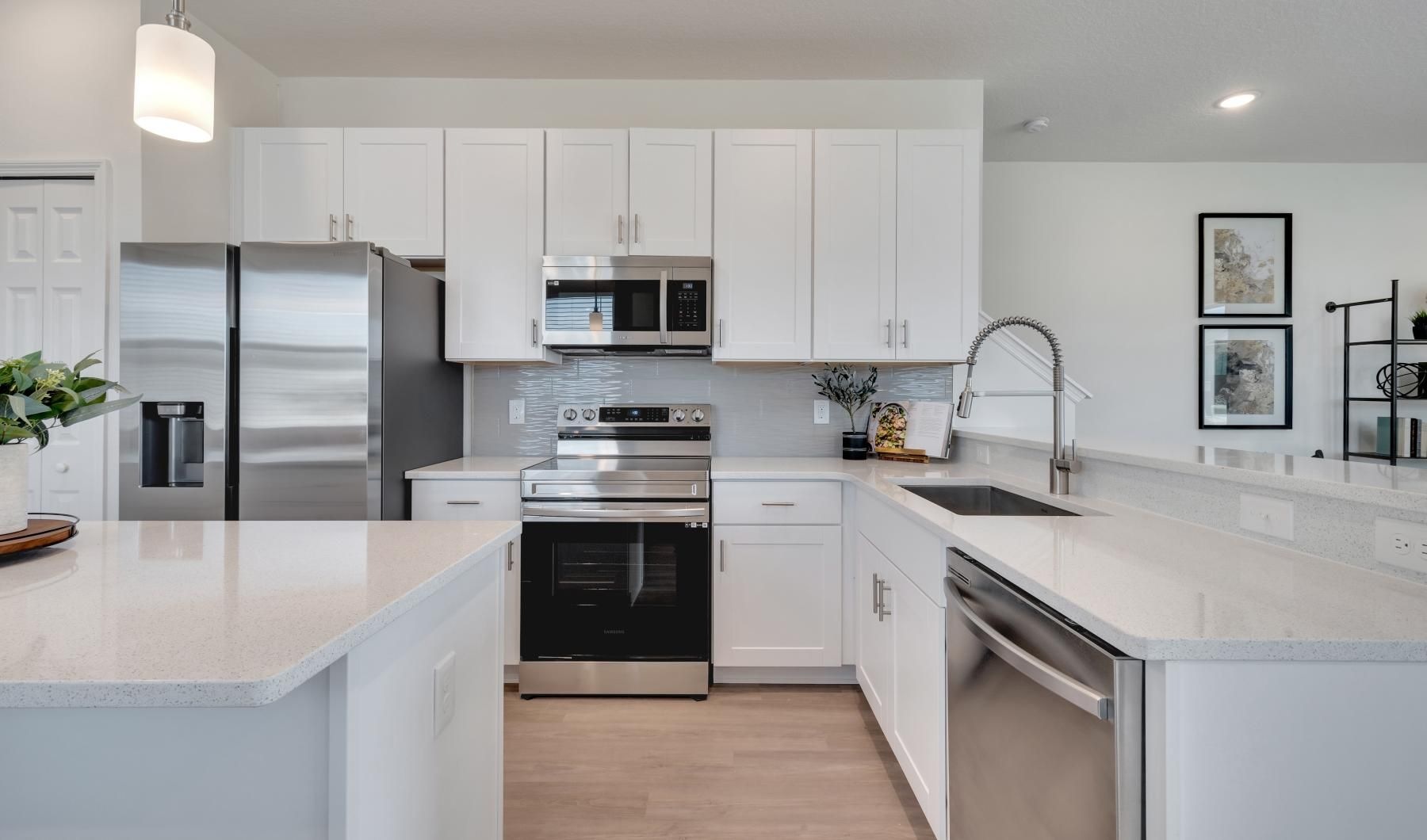 A perfect fit for the whole family a kitchen with white cabinets